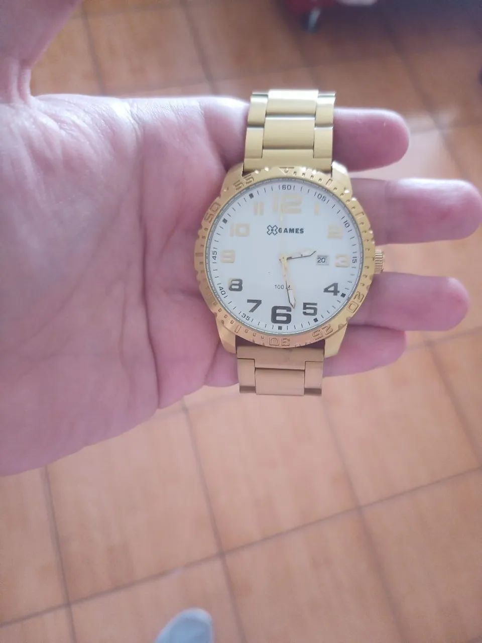 Relógio Marca Xgames, dourado, com fundo branco, novo. - Foto 3