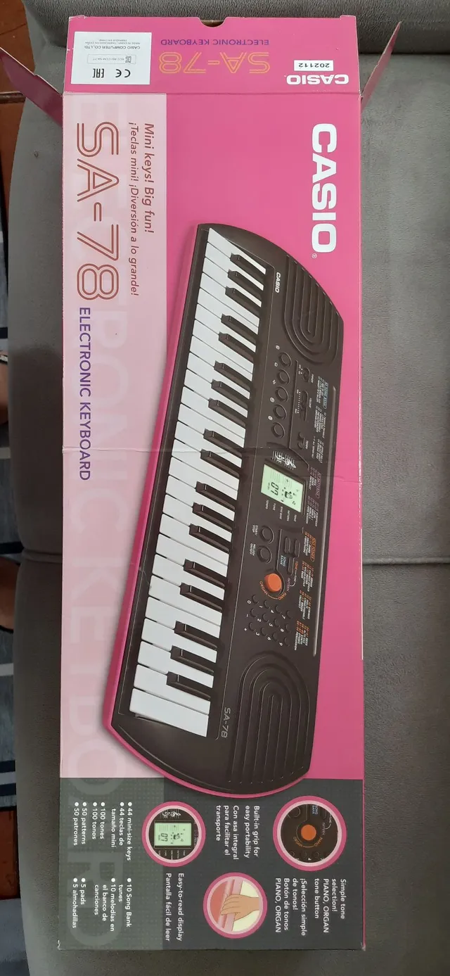 Teclado Casio Infantil Sa 76 Laranja 44 Teclas Com Fonte