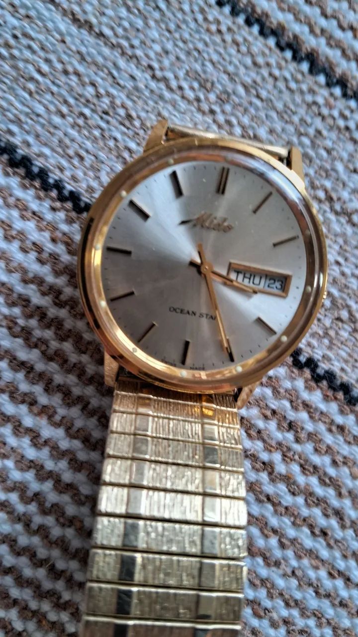Relogio mido ocean star dourado