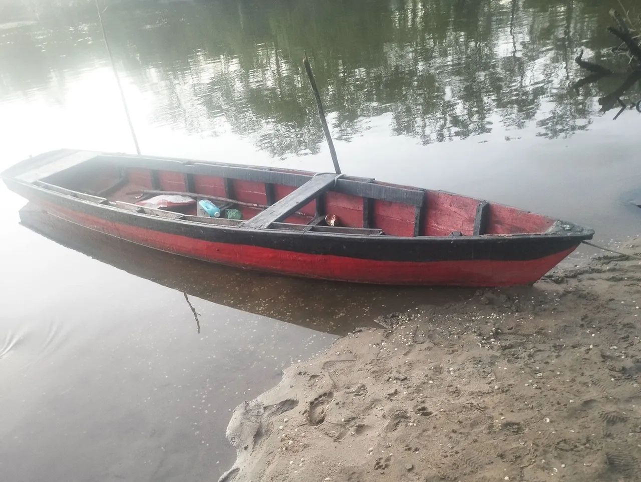 Vende-se canoa e motor 
