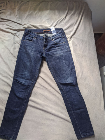 calça jeans lacoste feminina