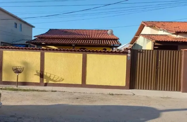 Amparo Imóveis-Vendo casa em condomínio 2 quartos com excelente quintal-Araruama