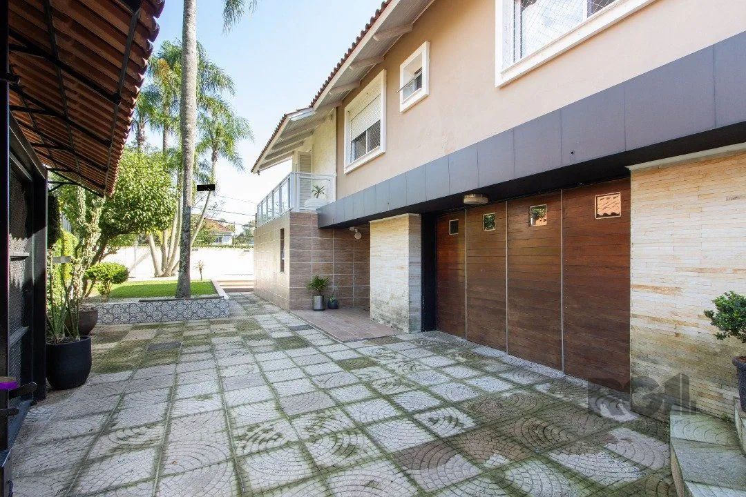 Casa a venda no bairro Guarujá com 4 dormitórios, piscina e salão de festas - Foto 5