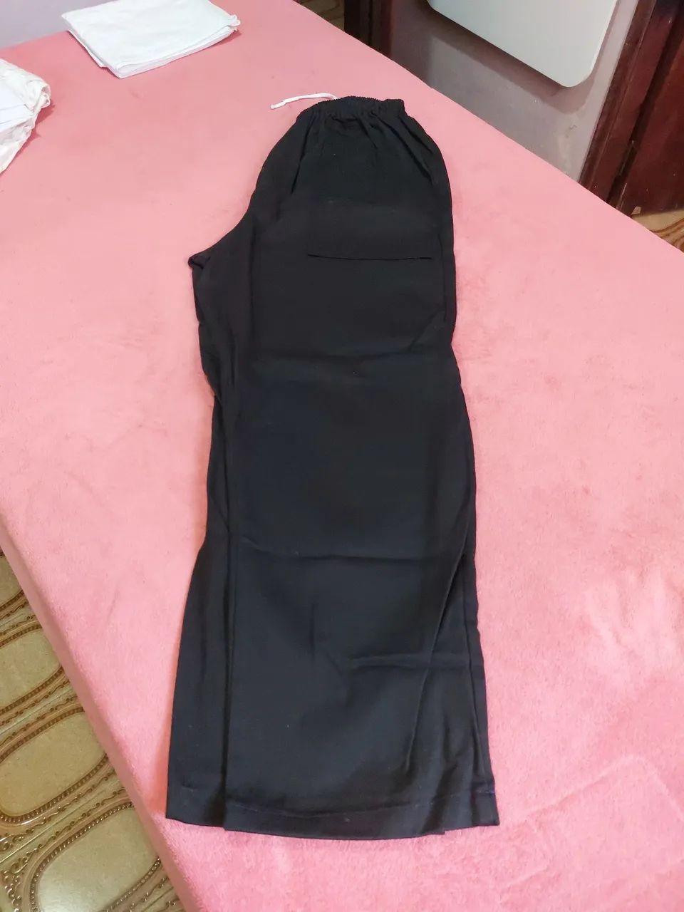 Calça preta de ração 