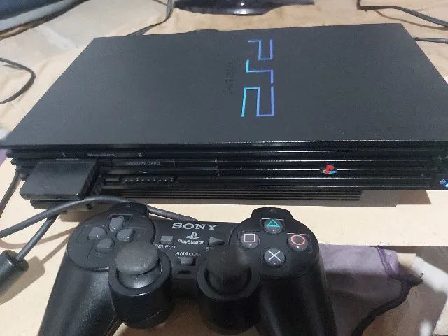 Playstation 2 FAT destravado   DVD  funciona  normal  mais 3 jogos ps2 + 2 jogos ps1  - Foto 4