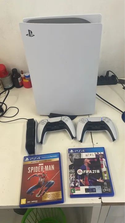 Ps5 usado de 1 ano e 3 meses nunca deu problema  +  2 controles  +  base de carregamento - Foto 2