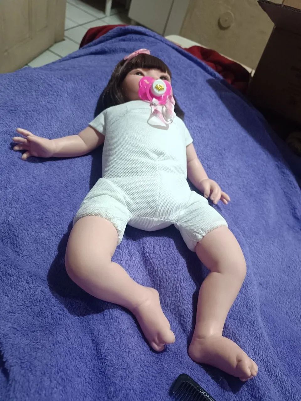 Bb reborn Sid nyl 50cm vem com assessórios certidão e roupinha nova   - Foto 5
