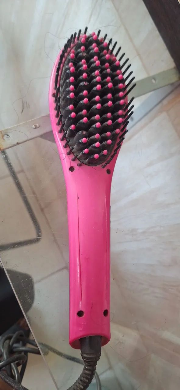 Escovas de cabelo elétrica funcionando perfeitamente