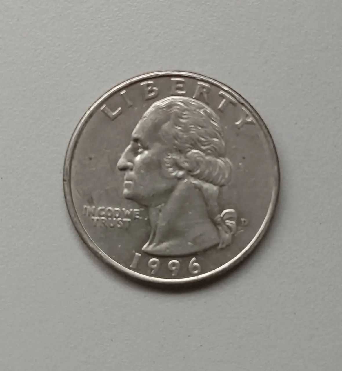 Moeda antiga de 25 centavos americano - Foto 2