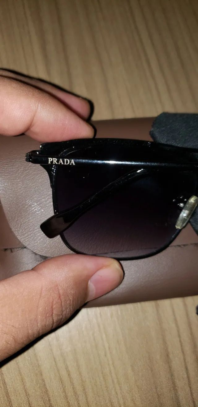 Óculos linha luxo semi novo 