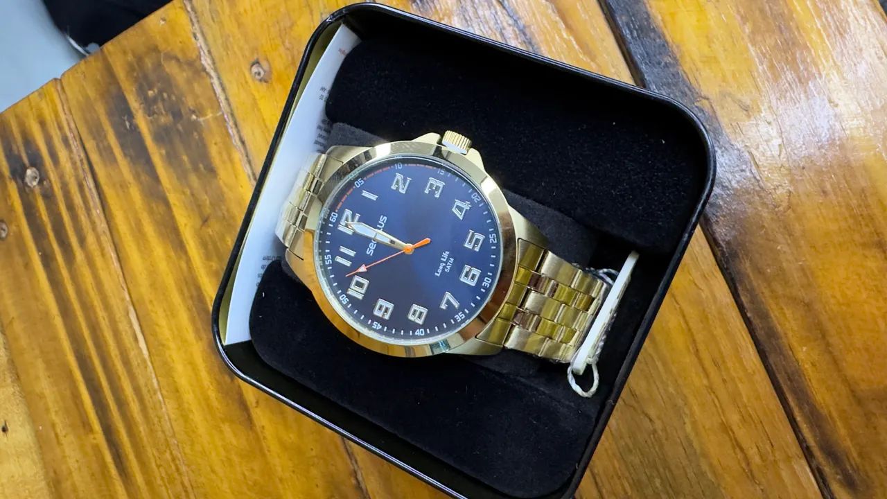 Relógio Seculus masculino dourado em aço fundo azul - Foto 4