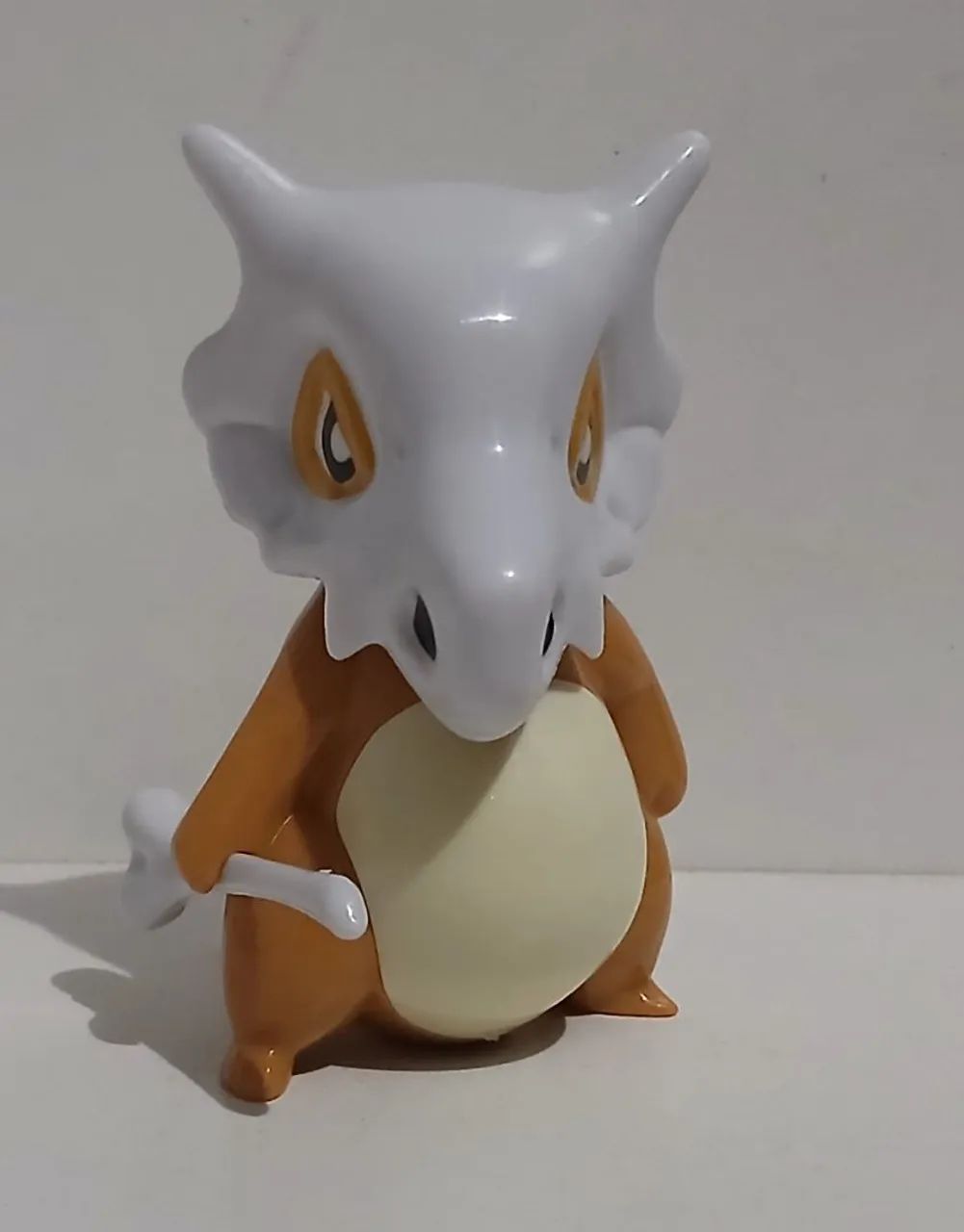 BONECO ACTION FIGURE MINIATURA POKEMON CUBONE OCO POR DENTRO
