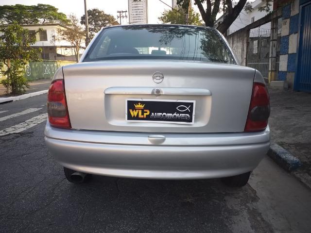 Corsa sedan 2001 financiamento com score baixo baixa entrada - Foto 12