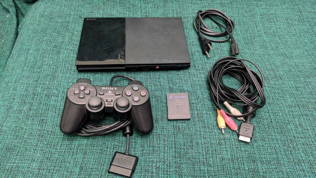 Playstation 2 usado em bom estado de conservação - TOPA TUDO GAMES