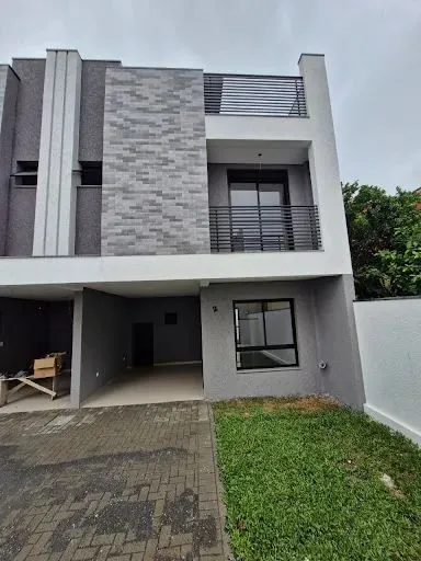 Sobrado com 3 dormitórios à venda, 127 m² por R$ 699.000 - Uberaba - Curitiba/PR