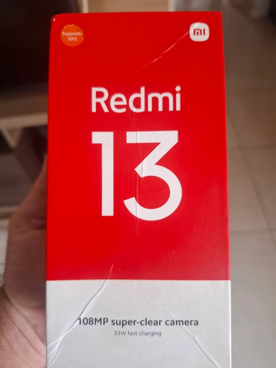 Celular semi novo Redmi..13