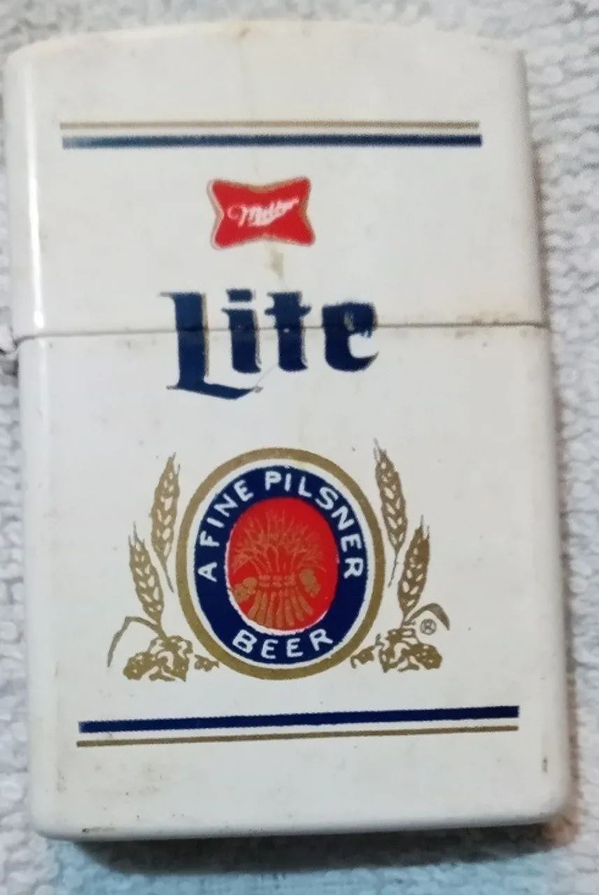 Antigo isqueiro com o logo da cerveja Miller Lite - Anos 80/90 