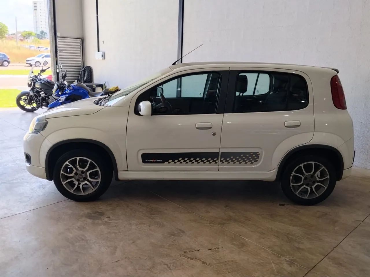 Fiat Uno Sporting 1.4 EVO Fire Flex 8V 4P 2014 - Foto 4