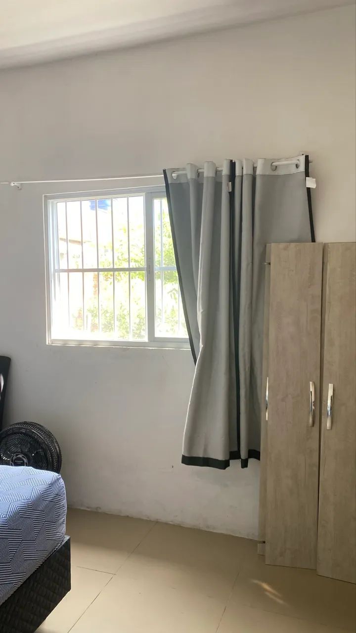 Quarto em casa compartilhada