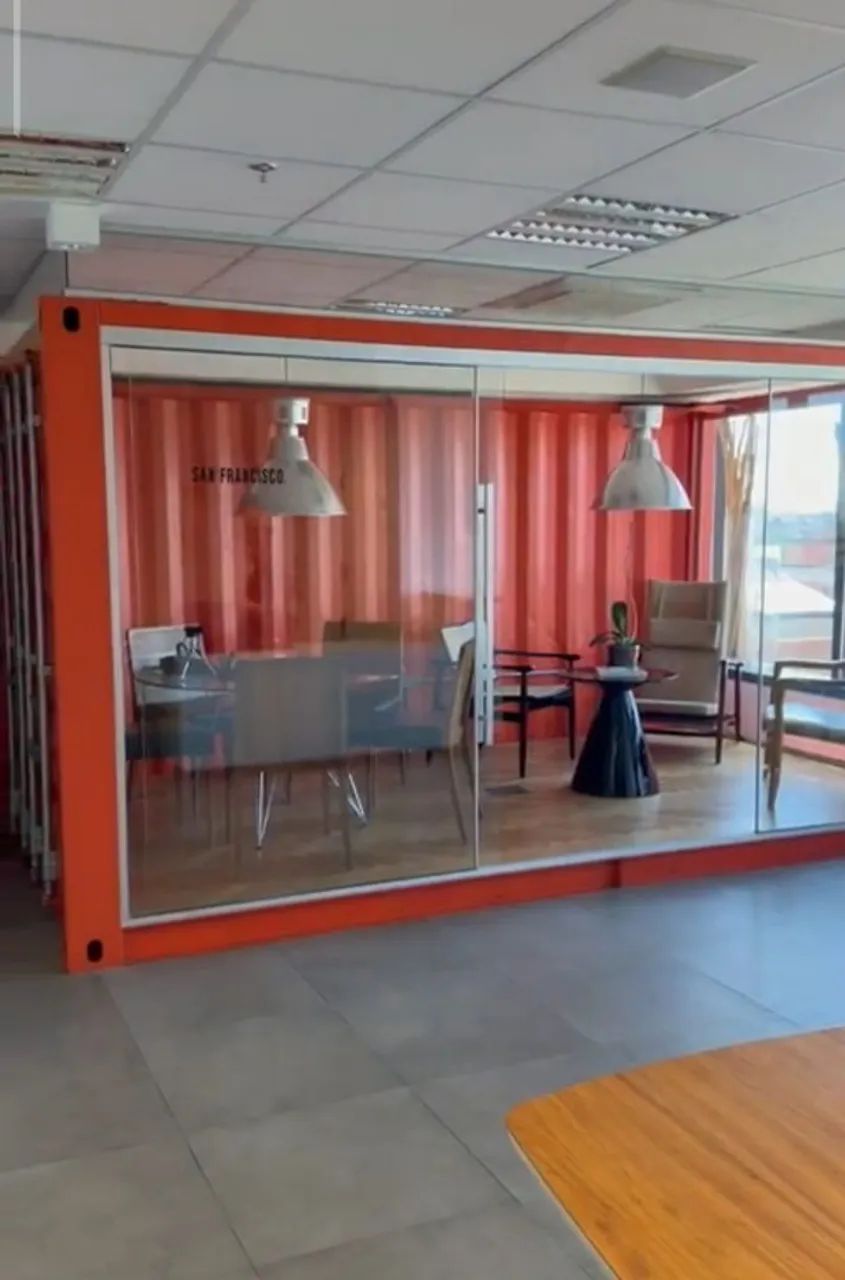 Container with glass side panels