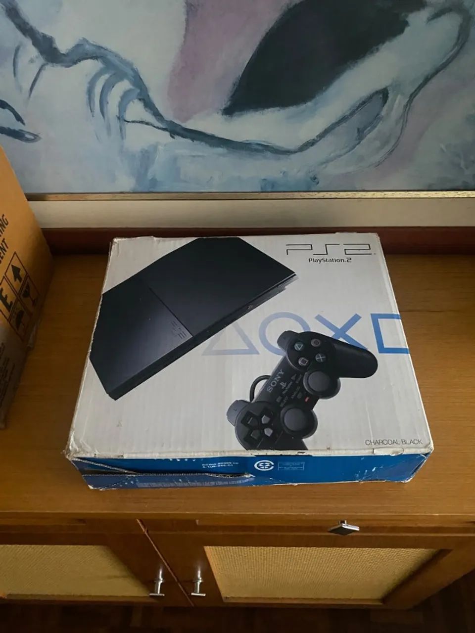PS2 Slim com 2 controles NA CAIXA