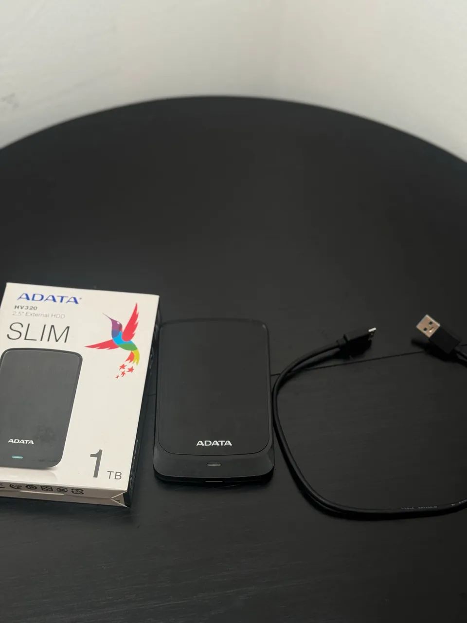 HD externo 1TB muito novo ADATA - Foto 3