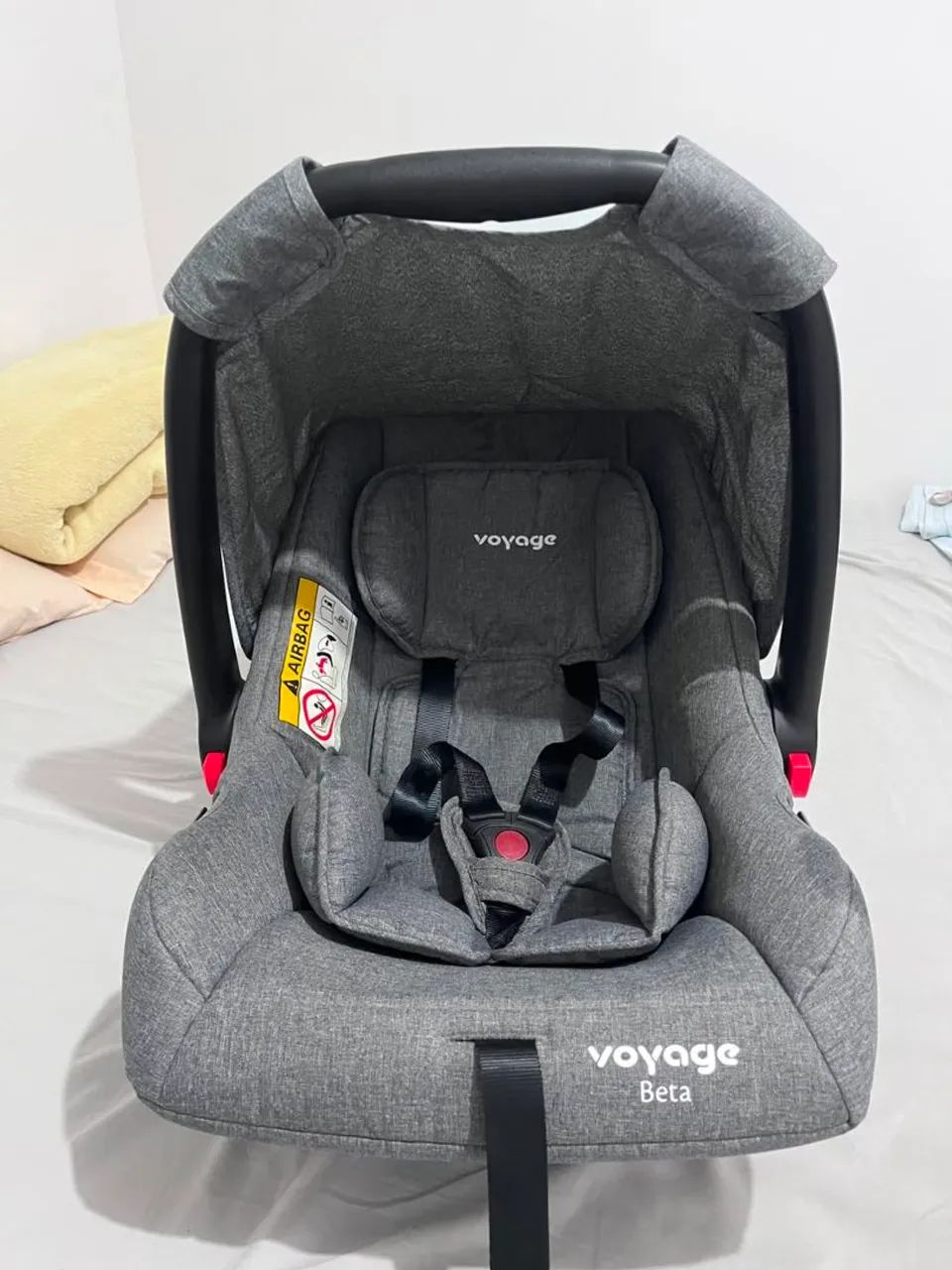 Bebê conforto Voyage Beta