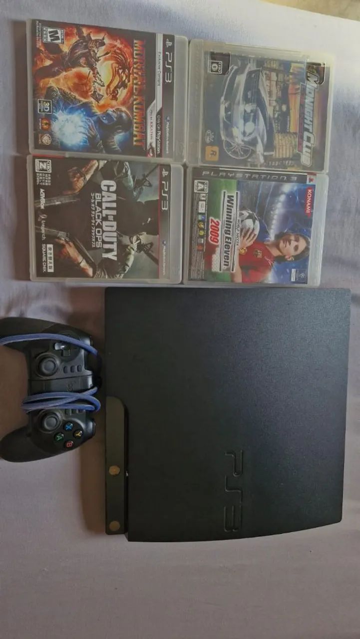Vendo ps3 com 5 jogos físicos e 5 digitais,game original nao
