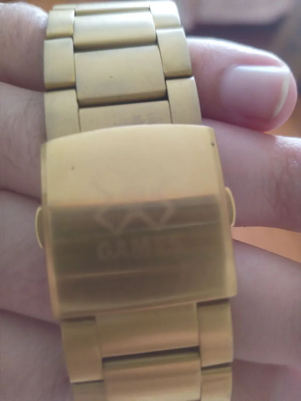 Relógio Marca Xgames, dourado, com fundo branco, novo. - Foto 4