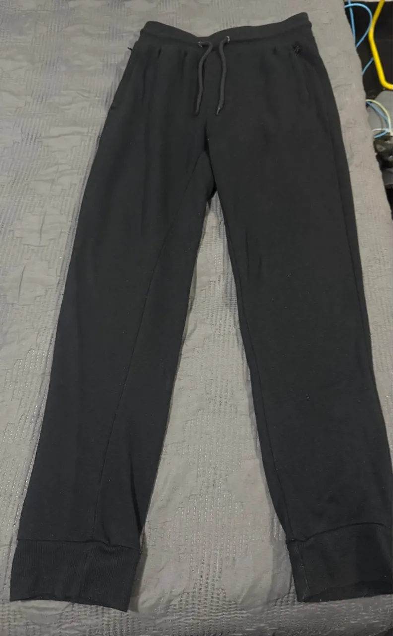 Calça de Moletom com zíper nos bolsos P adulto