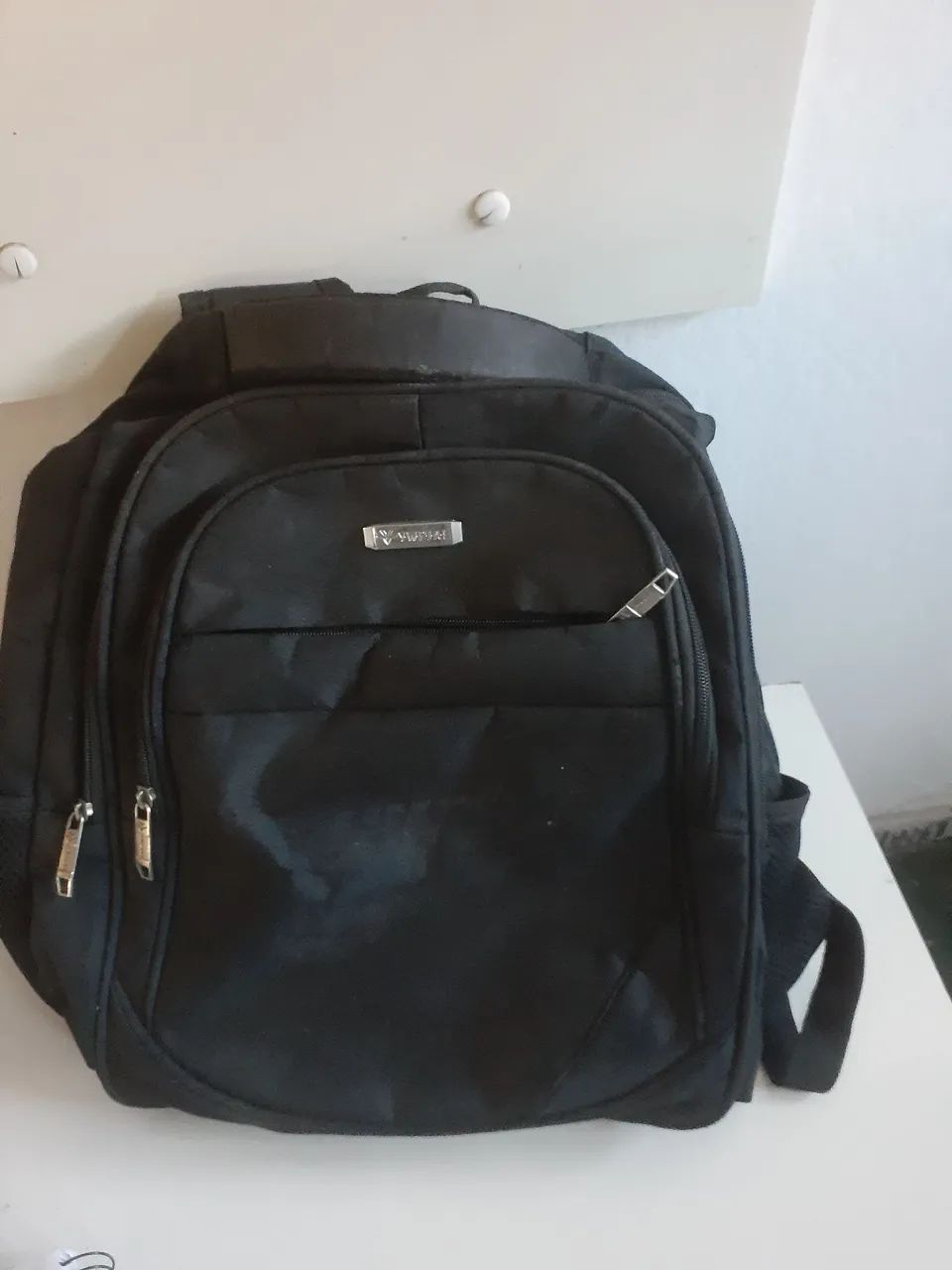 Vendo  . Mochila   preta..