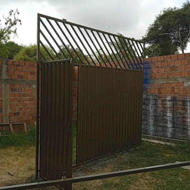 PORTÃO PARA GARAGEM GRANDE MATERIAL GALVANIZADO METALÚRGICA JG  - Foto 3