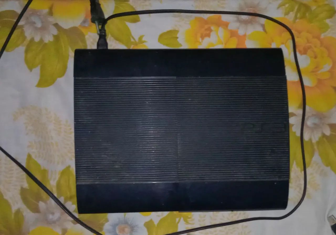 Vendo PS3 Super Slim com acessórios e jogos - Foto 2