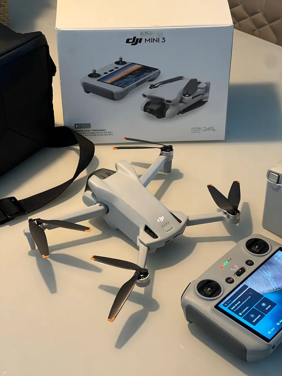 Drone DJI Mini 3 Fly More Combo - RC com tela e 3 baterias 4k - Foto 2