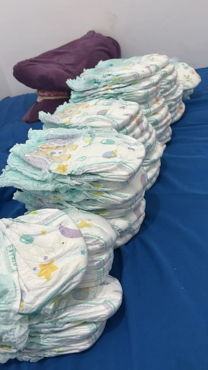 50 Fraldas Pampers ajuste total - Foto 2