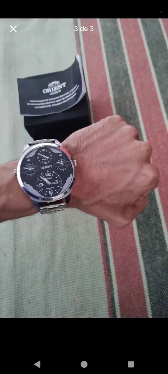 Relógio Orient inox 