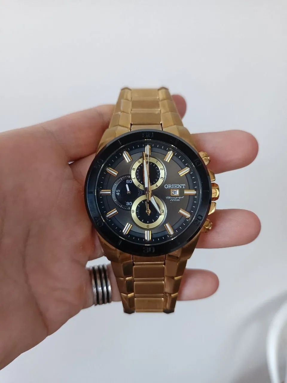 Relógio Oriente Série ouro na caixa 
