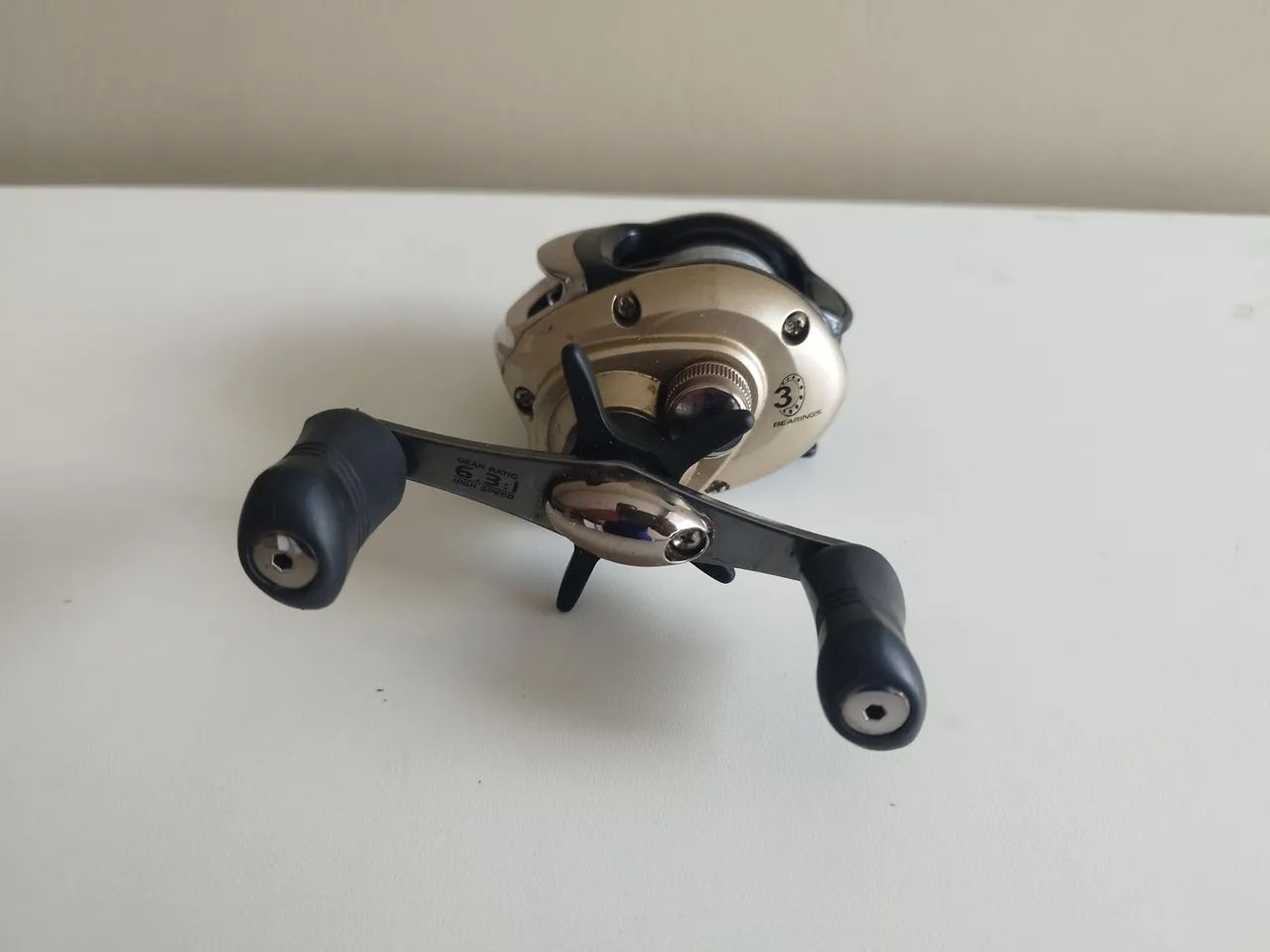 Carretilha de pesca Marine sporte elite 3.000 esquerda dourada - Foto 3