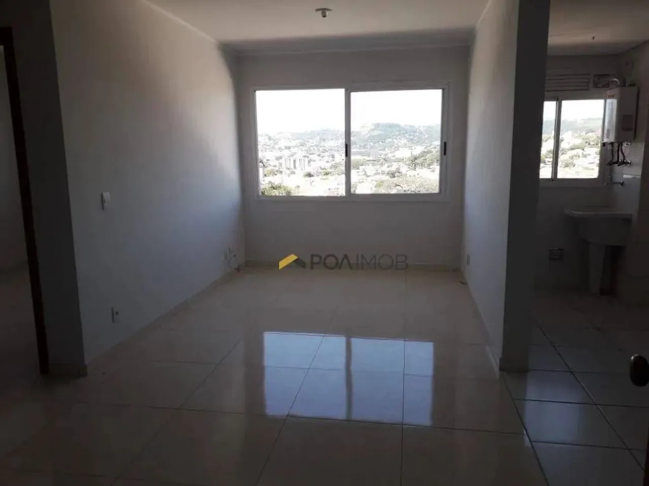 Apartamento com 2 dormitórios para alugar, 58 m² por R$ 2.000,00/mês - Santa Tereza - Port