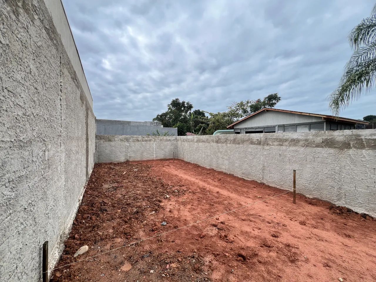 Unidade 03 - Parte Ideal de Lote com 72m2 Murado e Aterrado  - Foto 3