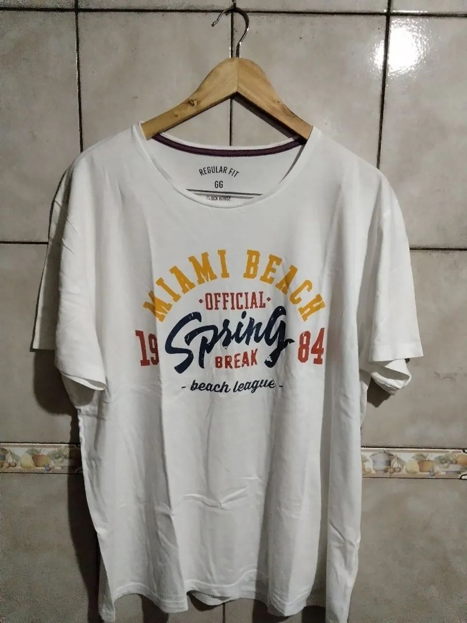 Camiseta masculina clock house