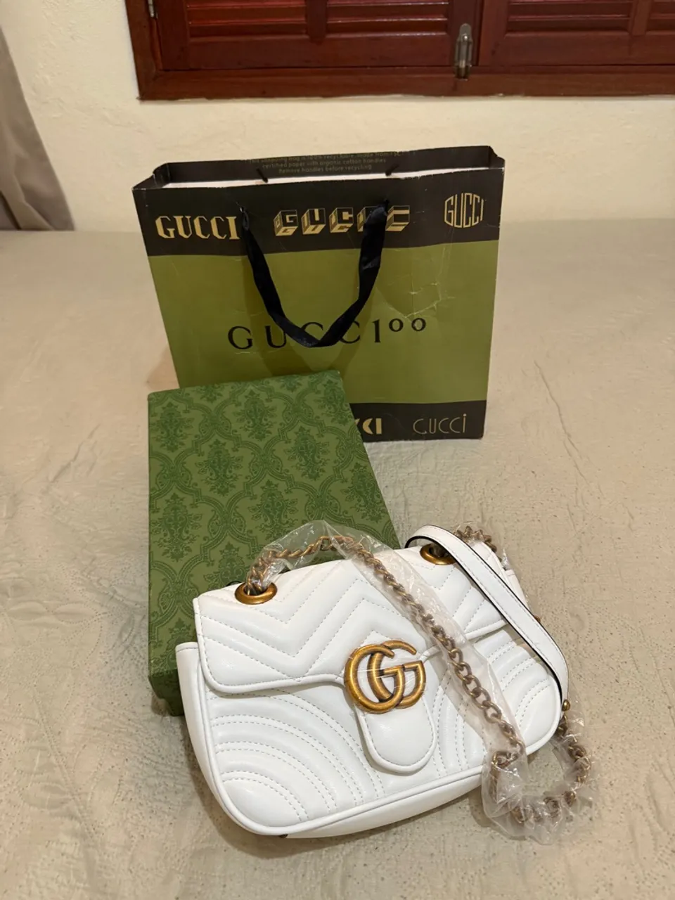 Bolsa Gucci G Marmont