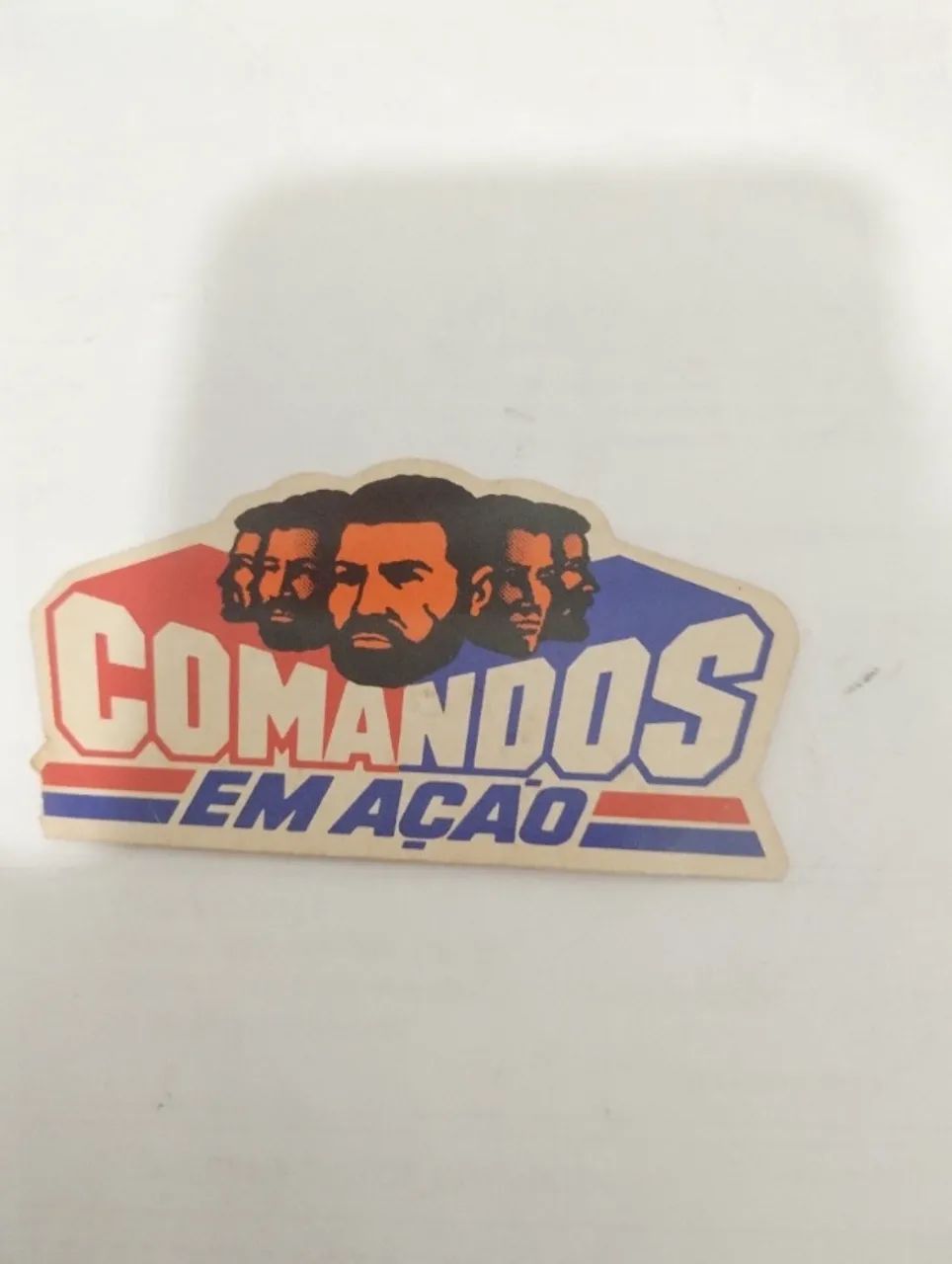 comandos em ação, decalque e fragmentos de embalagens do brinquedo