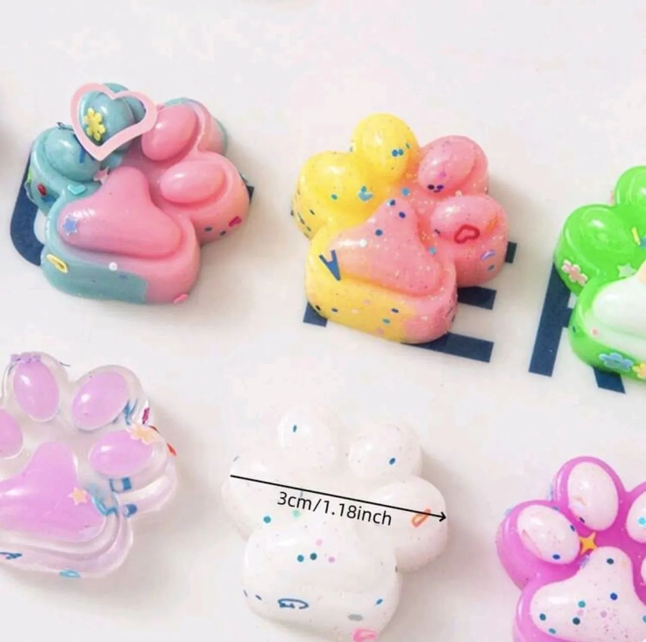 kit com 10 mini squishy patinhas de apertar  - Foto 2
