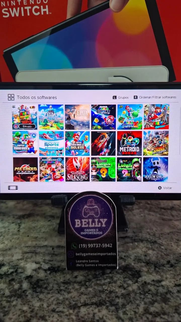 NINTENDO SWITCH OLED BRANCO DESBLOQUEADO NA CAIXA COM 21 JOGOS - Foto 2