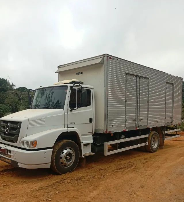 1319 REDUZIDO COM AR CONDICIONADO E VIDROS ELÉTRICOS 