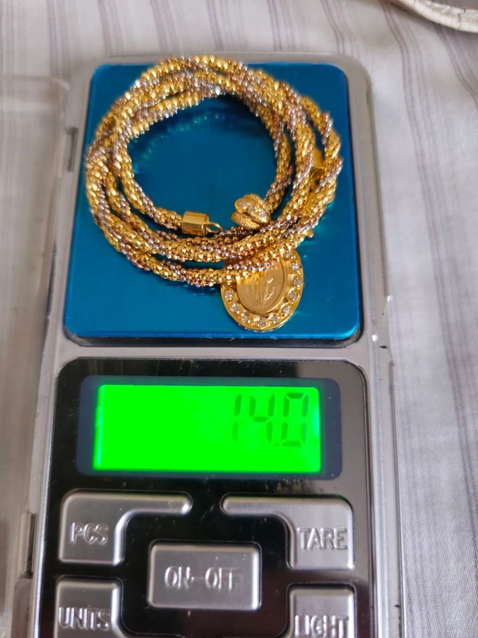 Cordão Ouro18k com pingente Nossa Senhora com brilhantes. 