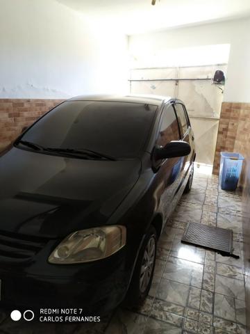 Vendo VW Fox 1.6 2005 4p Flex/GNV com ar/dh/trava - Foto 6