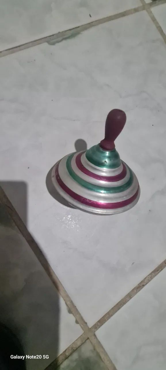 Peão giratório antigo