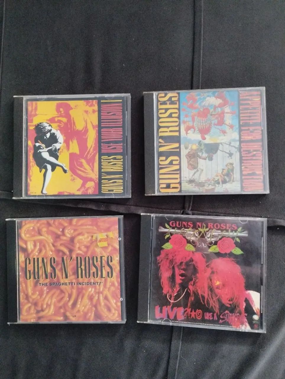 Quatro cds do Guns n` Roses
